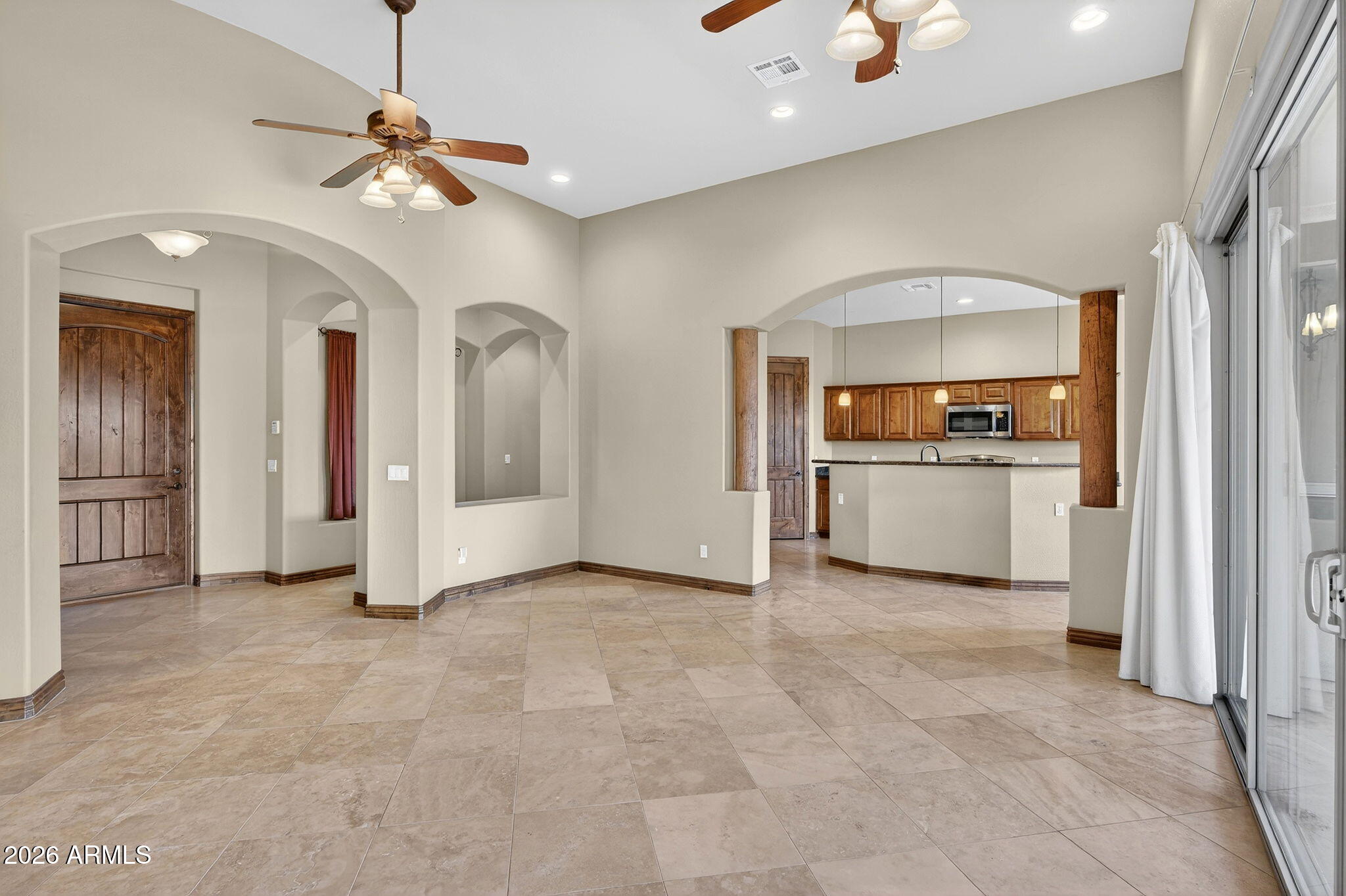 10000 Ginger Way Casa Grande, AZ 85194 - Photo 23 of 93 a view of a kitchen with a sink and dishwasher cabinets