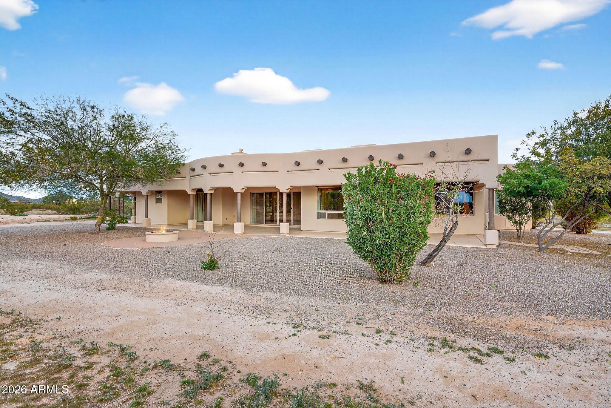 10000 Ginger Way Casa Grande, AZ 85194 - Photo 56 of 93 a view of a house with a yard and potted plants