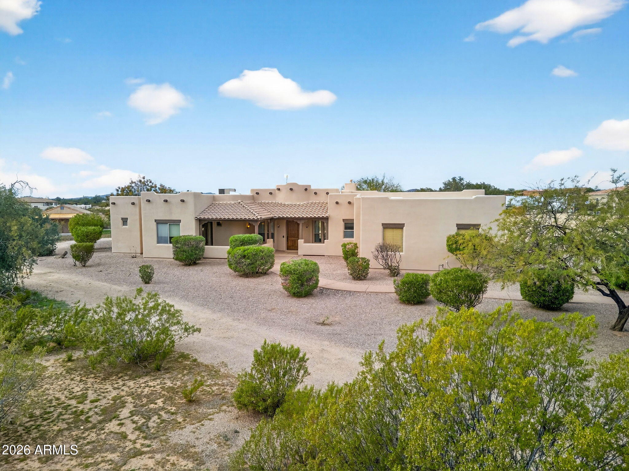 10000 Ginger Way Casa Grande, AZ 85194 - Photo 69 of 93 a view of a lake with lawn chairs and a potted plant
