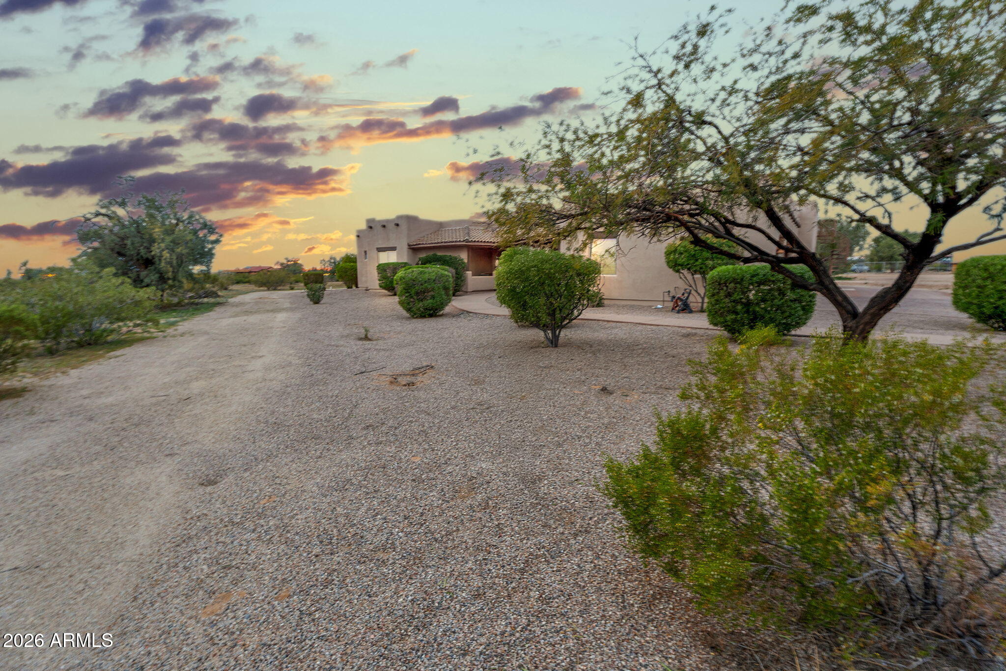 10000 Ginger Way Casa Grande, AZ 85194 - Photo 9 of 93 a front view of a house with a yard and garage