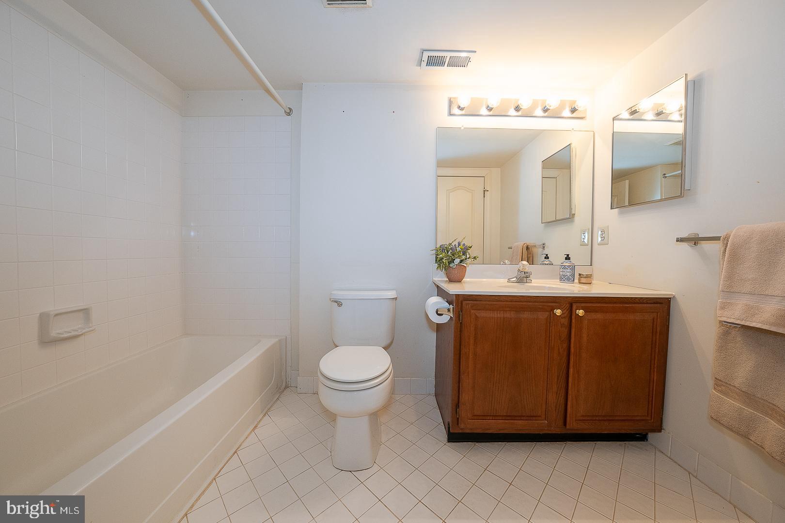 48 Longview Circle, Unit 48 Berwyn, PA 19312 - Photo 24 of 36 a bathroom with a sink toilet and shower