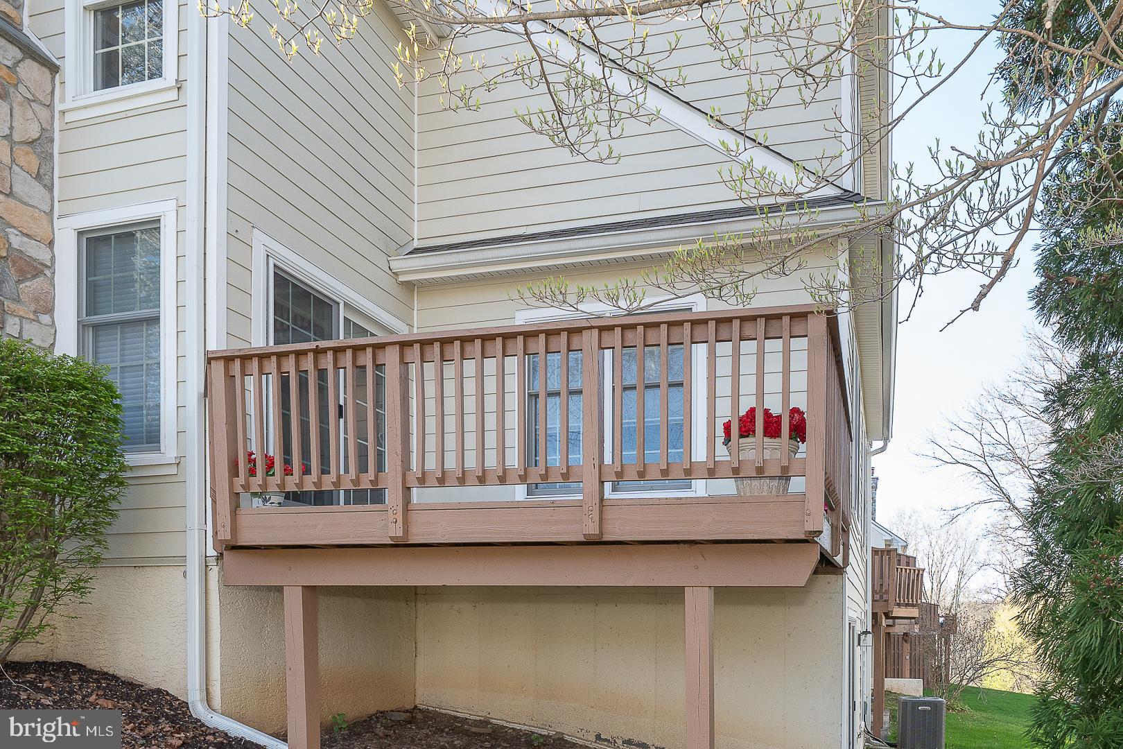 48 Longview Circle, Unit 48 Berwyn, PA 19312 - Photo 32 of 36 a white building with a outdoor space