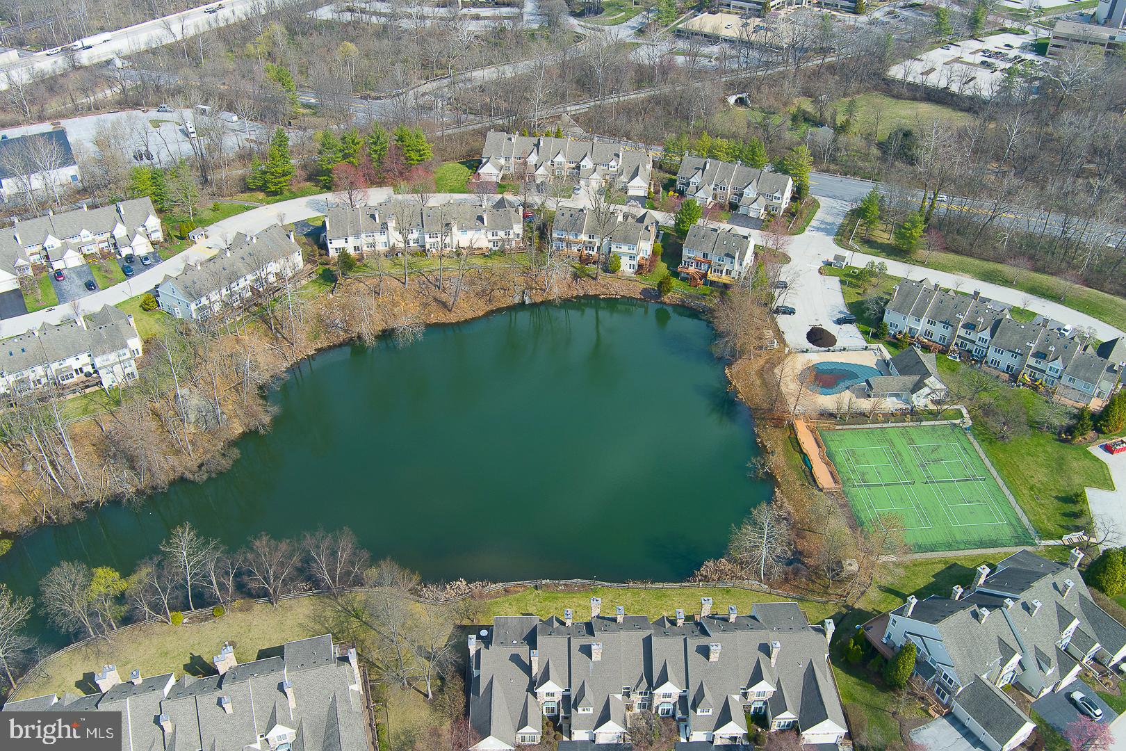 48 Longview Circle, Unit 48 Berwyn, PA 19312 - Photo 35 of 36 a view of a lake with a yard