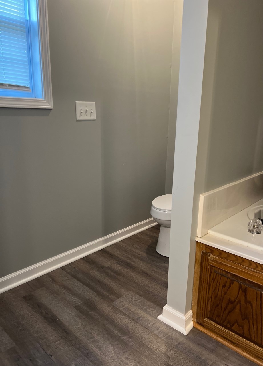 1004 Roland Court Cottontown, TN 37048 - Photo 11 of 22 a bathroom with a toilet and a sink