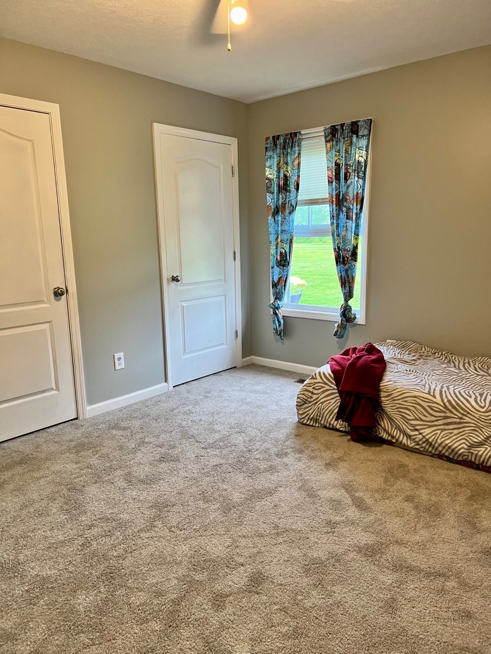 1004 Roland Court Cottontown, TN 37048 - Photo 16 of 22 a bed room with a bed and a window