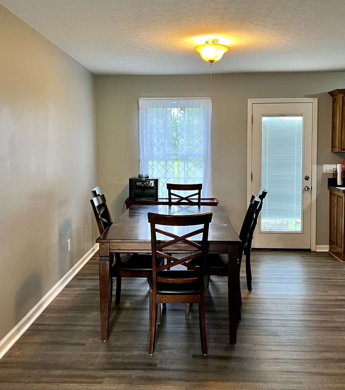 1004 Roland Court Cottontown, TN 37048 - Photo 7 of 22 a view of a a dining room with furniture window and wooden floor