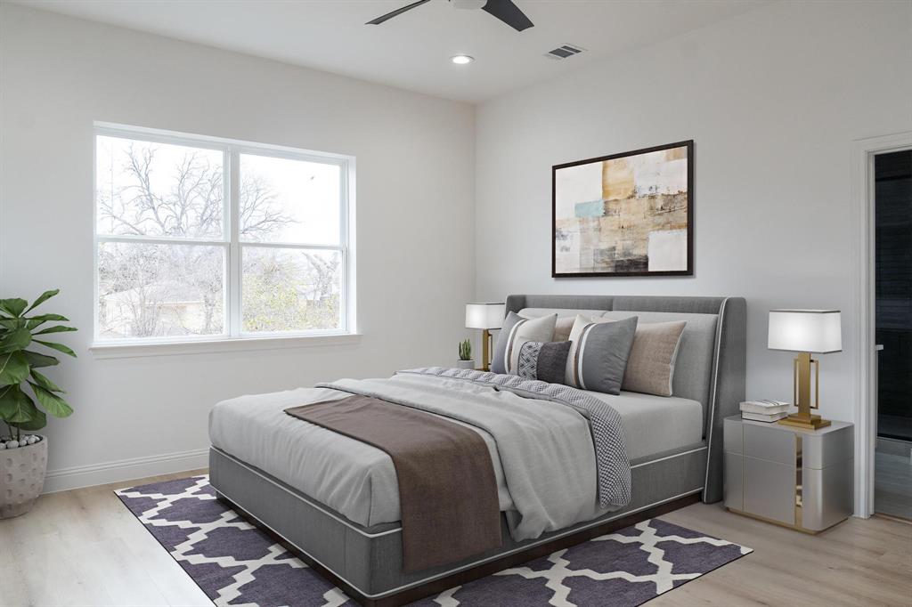 2725 1st Avenue Dallas, TX 75210 - Photo 11 of 29 a bedroom with a bed and a window