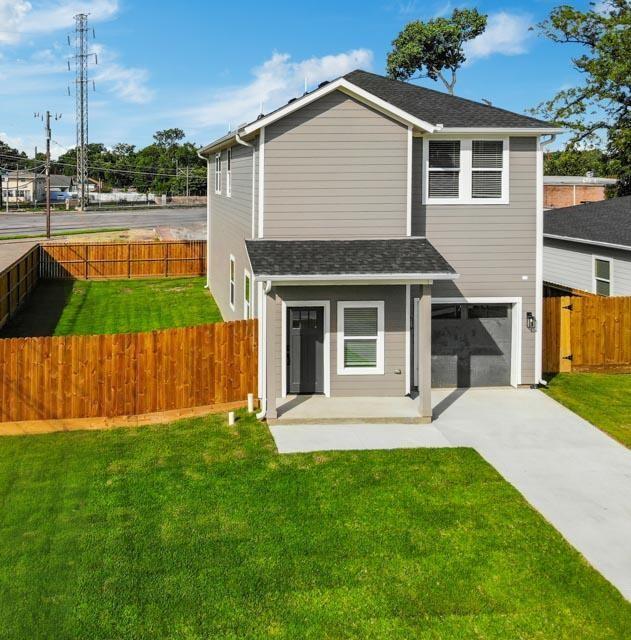 2725 1st Avenue Dallas, TX 75210 - Photo 3 of 29 a front view of a house with a yard