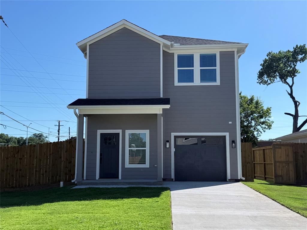 2725 1st Avenue Dallas, TX 75210 - Photo 6 of 29 a front view of a house with a garden