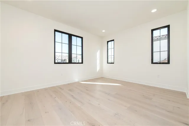 an empty room with windows