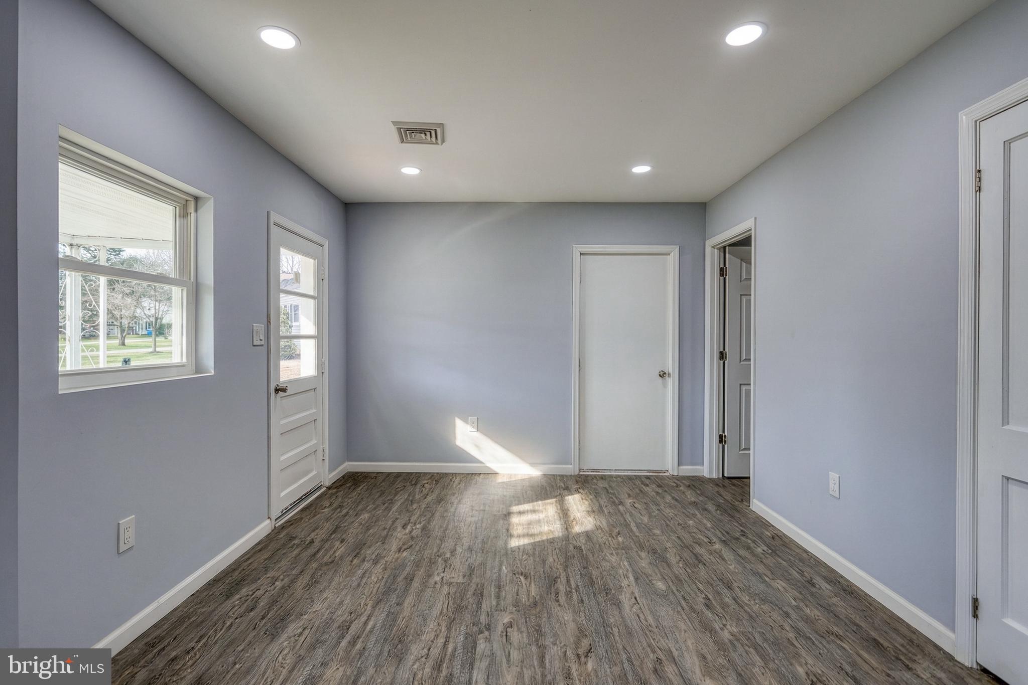 1400 Simpson Ferry Road New Cumberland, PA 17070 - Photo 19 of 31 a view of empty room with wooden floor and fan