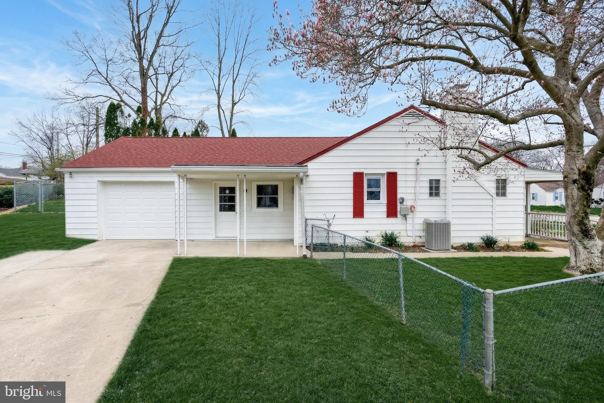 1400 Simpson Ferry Road New Cumberland, PA 17070 - Photo 2 of 31 a front view of a house with a yard