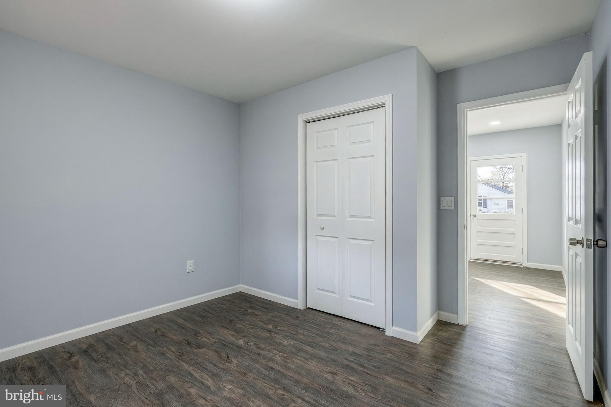 1400 Simpson Ferry Road New Cumberland, PA 17070 - Photo 24 of 31 an empty room with wooden floor & closet area