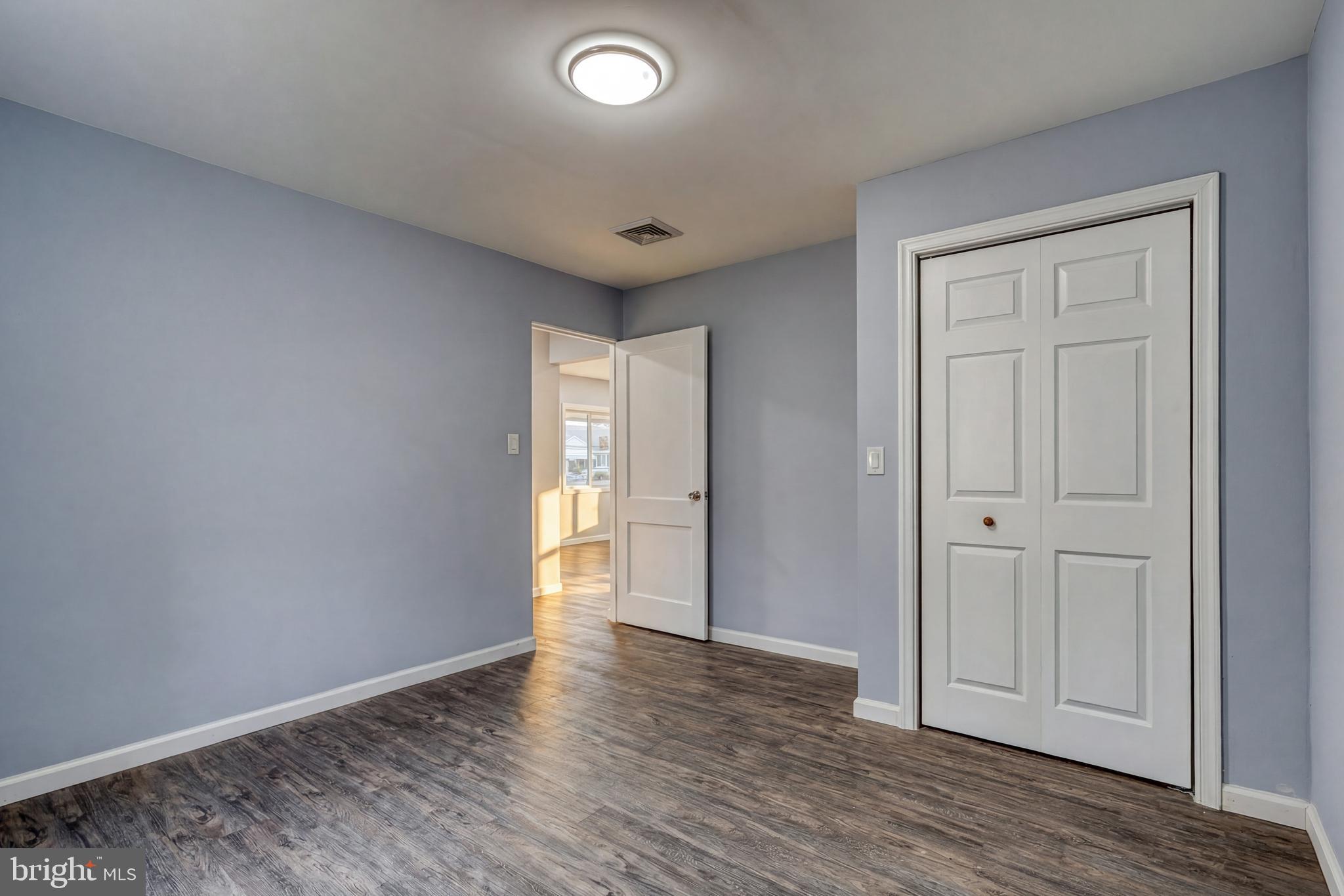 1400 Simpson Ferry Road New Cumberland, PA 17070 - Photo 27 of 31 a view of an empty room and wooden floor