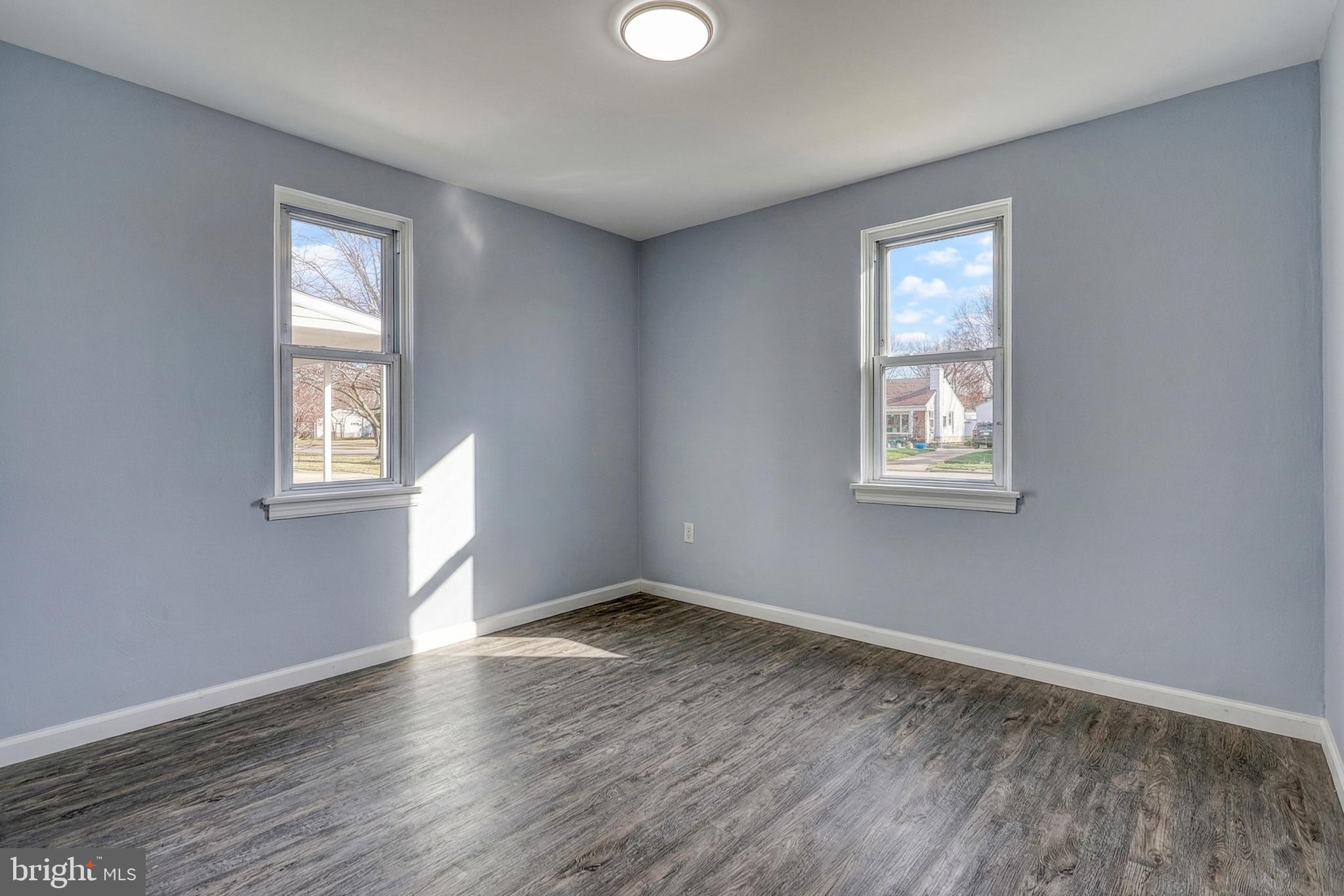 1400 Simpson Ferry Road New Cumberland, PA 17070 - Photo 28 of 31 an empty room with windows and closet
