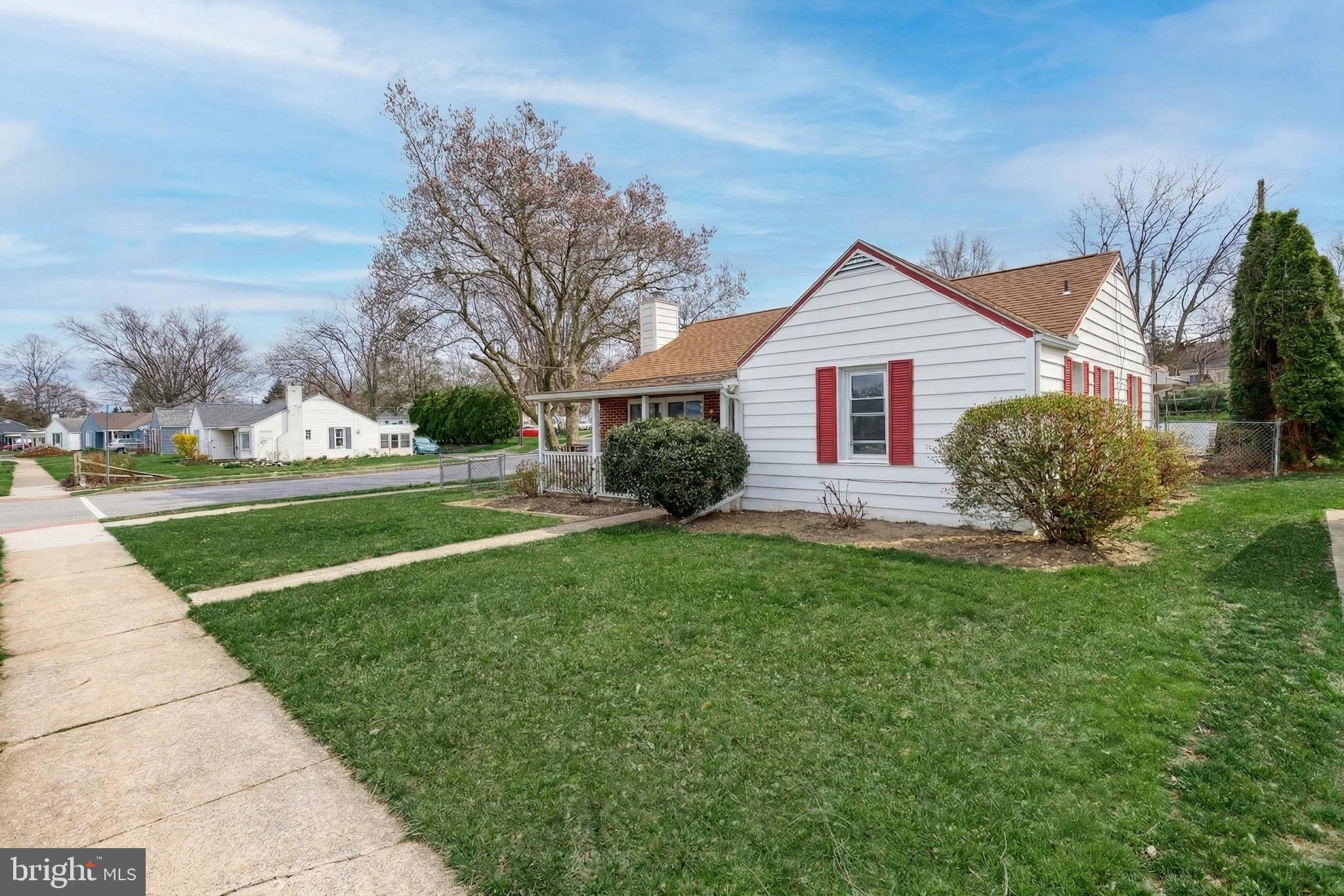 1400 Simpson Ferry Road New Cumberland, PA 17070 - Photo 6 of 31 a view of a house with a yard
