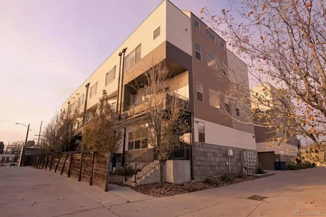 a view of a building with a street