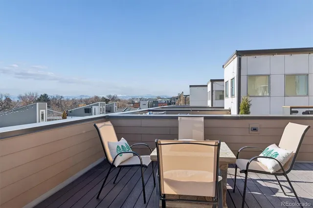a view of a chairs and table on the terrace