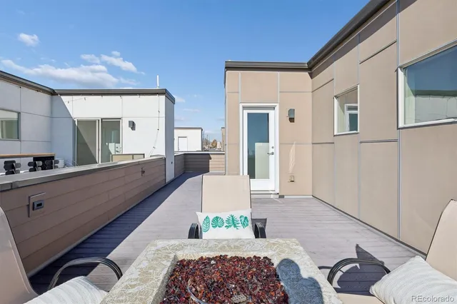 a large room with a couch and a view of living room