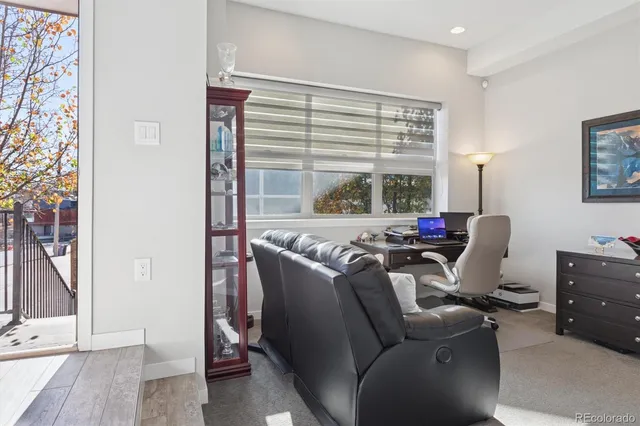 a work room with furniture and window