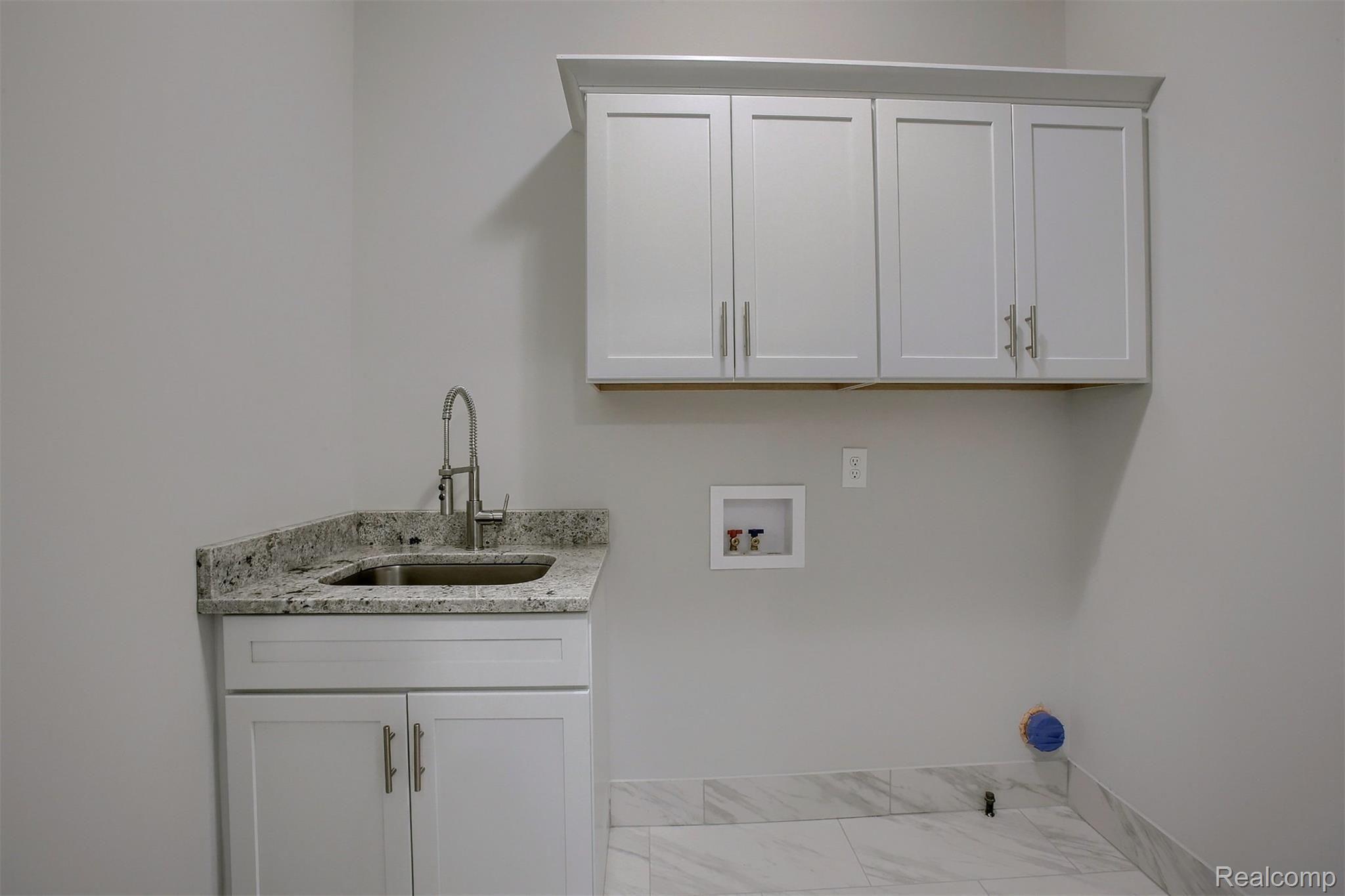775 East Long Lake Road Troy, MI 48085 - Photo 18 of 39 18-Laundry Room.jpg