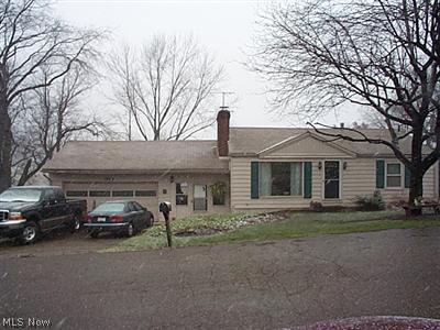 1703 Spring Valley Avenue Northwest Canton, OH 44708 - Photo 1 of 1 Wonderful maintenaqnce free exterior. Walk-out LL with whirpool and patio overlooking the lake.