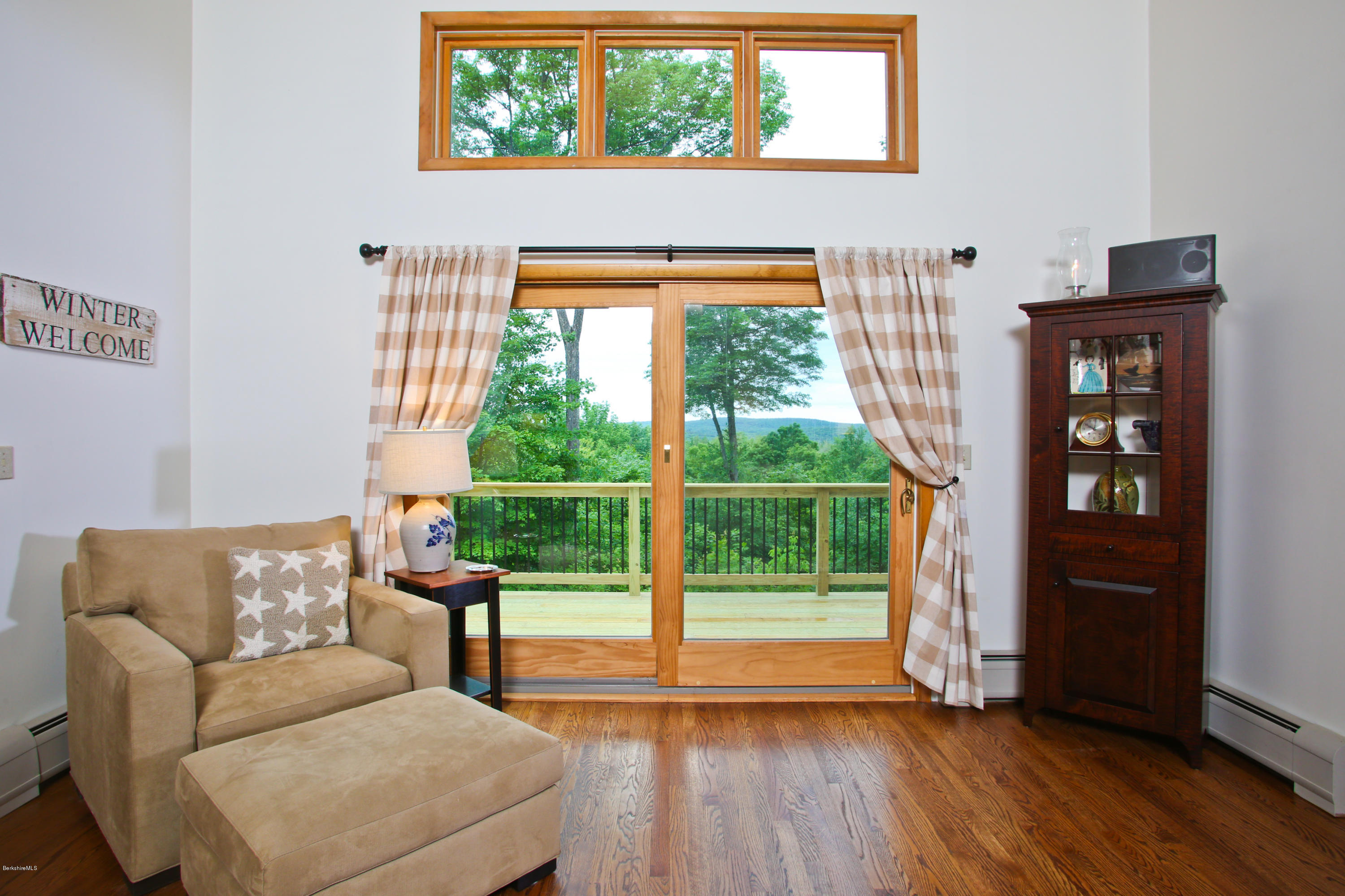 263 Harrington Road Otis, MA 01253 - Photo 15 of 33 a living room with furniture and a window