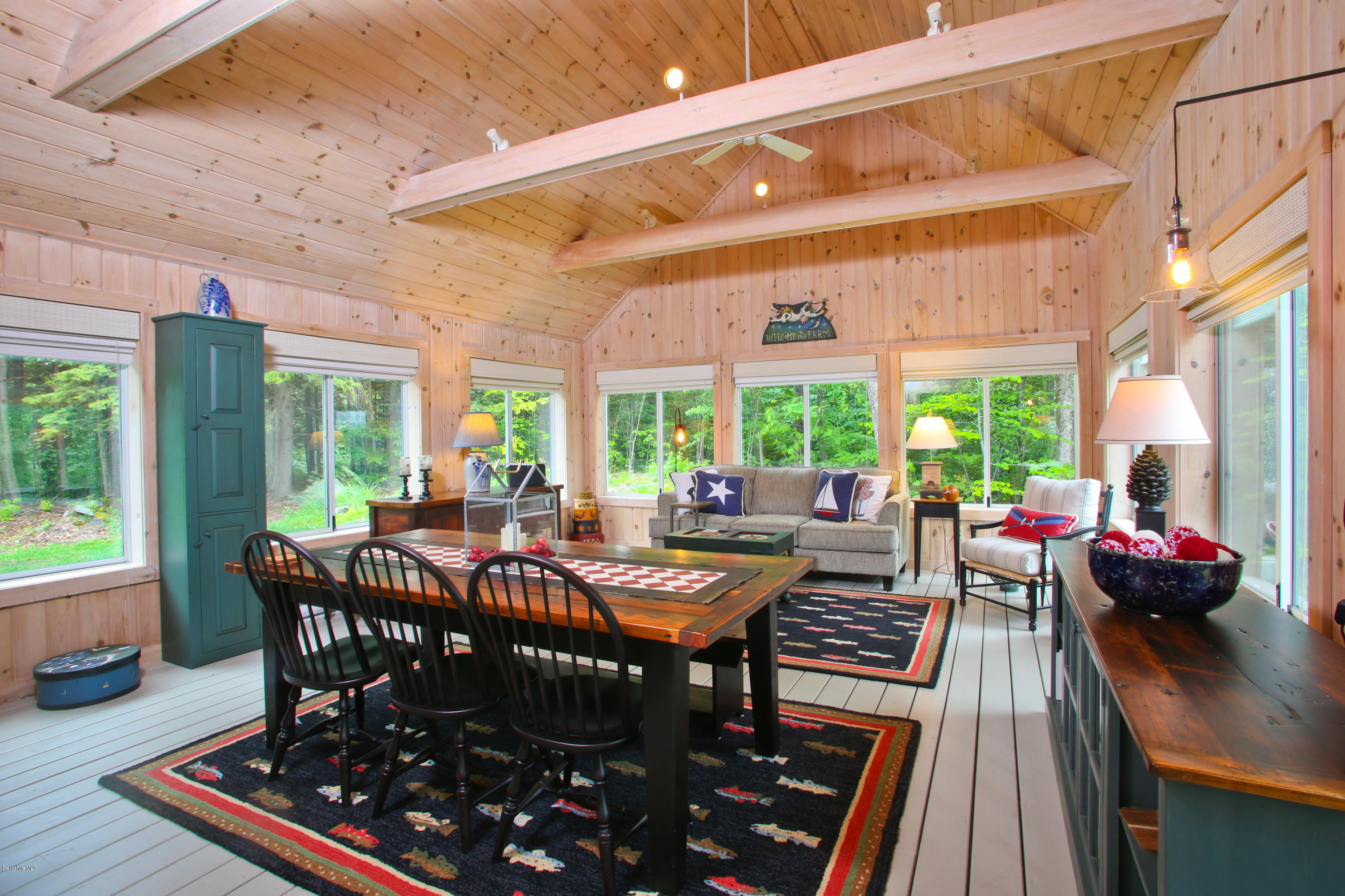 263 Harrington Road Otis, MA 01253 - Photo 18 of 33 a view of a patio with table and chairs and potted plants