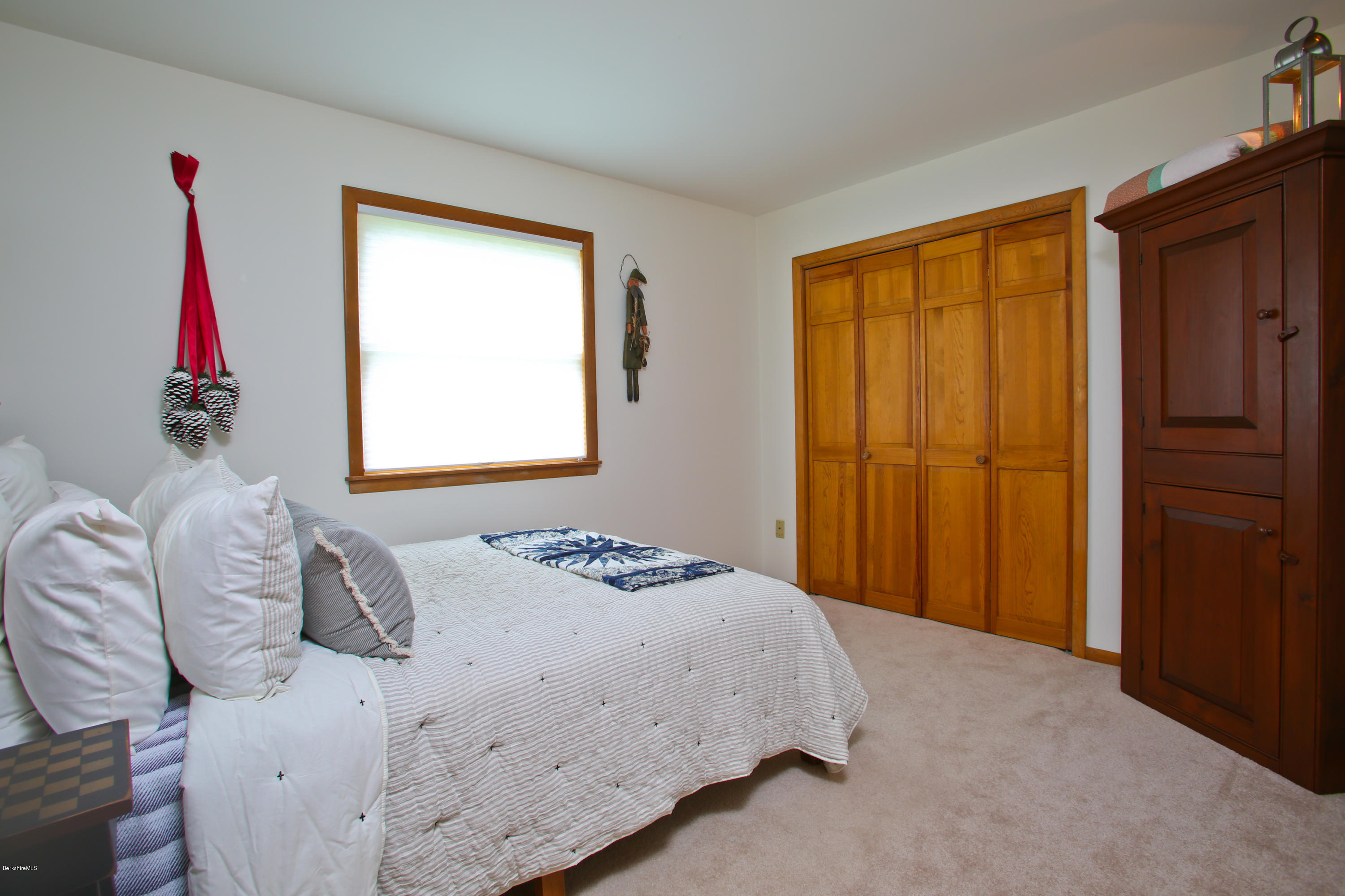 263 Harrington Road Otis, MA 01253 - Photo 24 of 33 a bedroom with a bed and a window