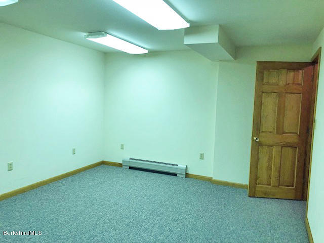 263 Harrington Road Otis, MA 01253 - Photo 27 of 33 an empty room with a workbench