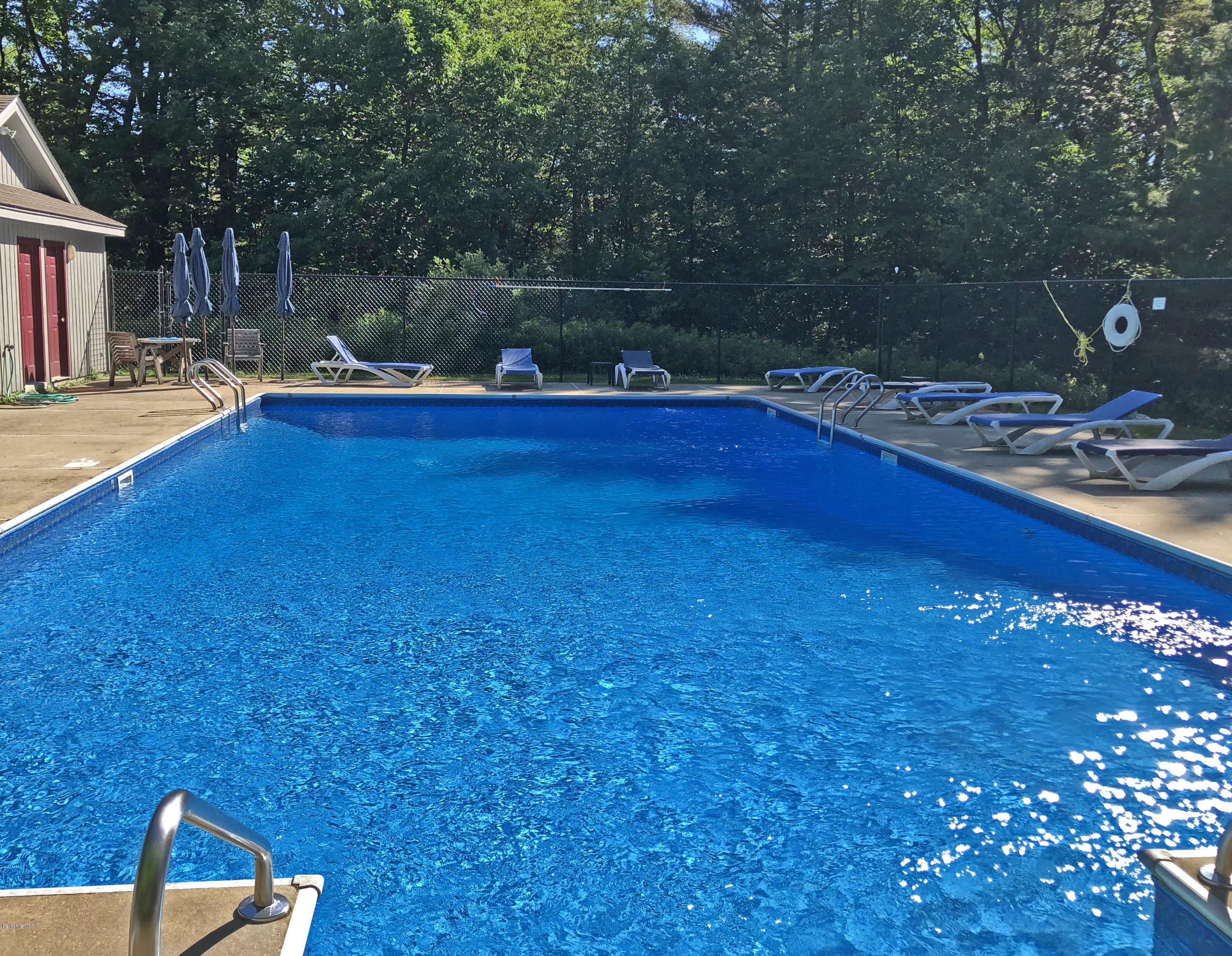 263 Harrington Road Otis, MA 01253 - Photo 31 of 33 a view of swimming pool with a patio