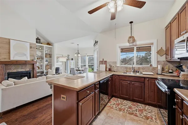 a view of front of house with a yard