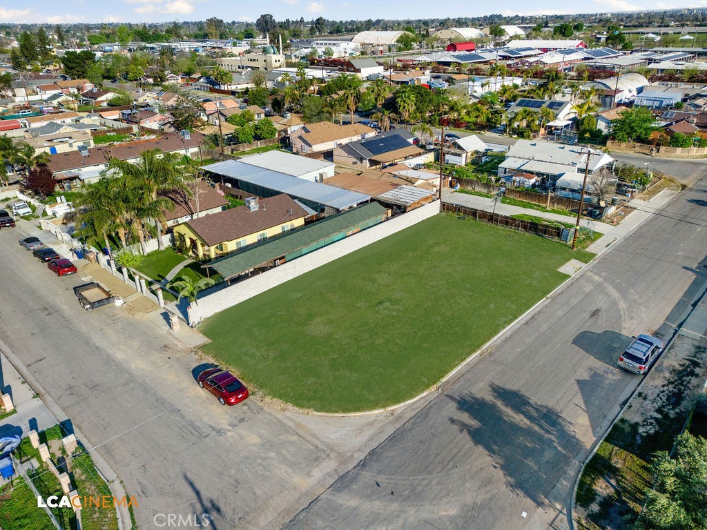 500 Lawson Road Bakersfield, CA 93307 - Photo 2 of 15 an aerial view of a tennis ground and a mountain view