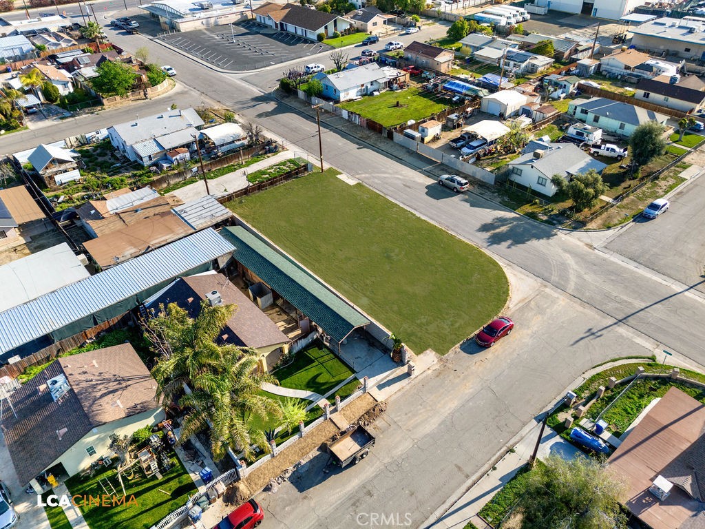 500 Lawson Road Bakersfield, CA 93307 - Photo 5 of 15 an aerial view of a pool yard an outdoor seating