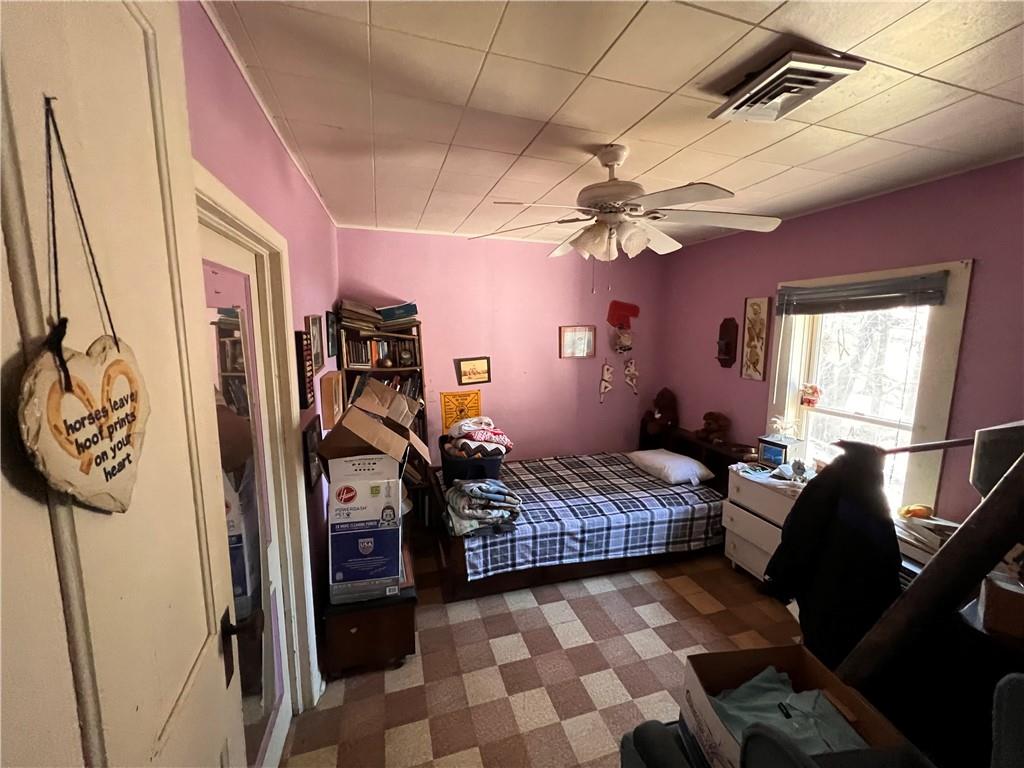 1722 Nashville Road Rochester Mills, PA 15771 - Photo 19 of 25 a bedroom with a bed next to a window