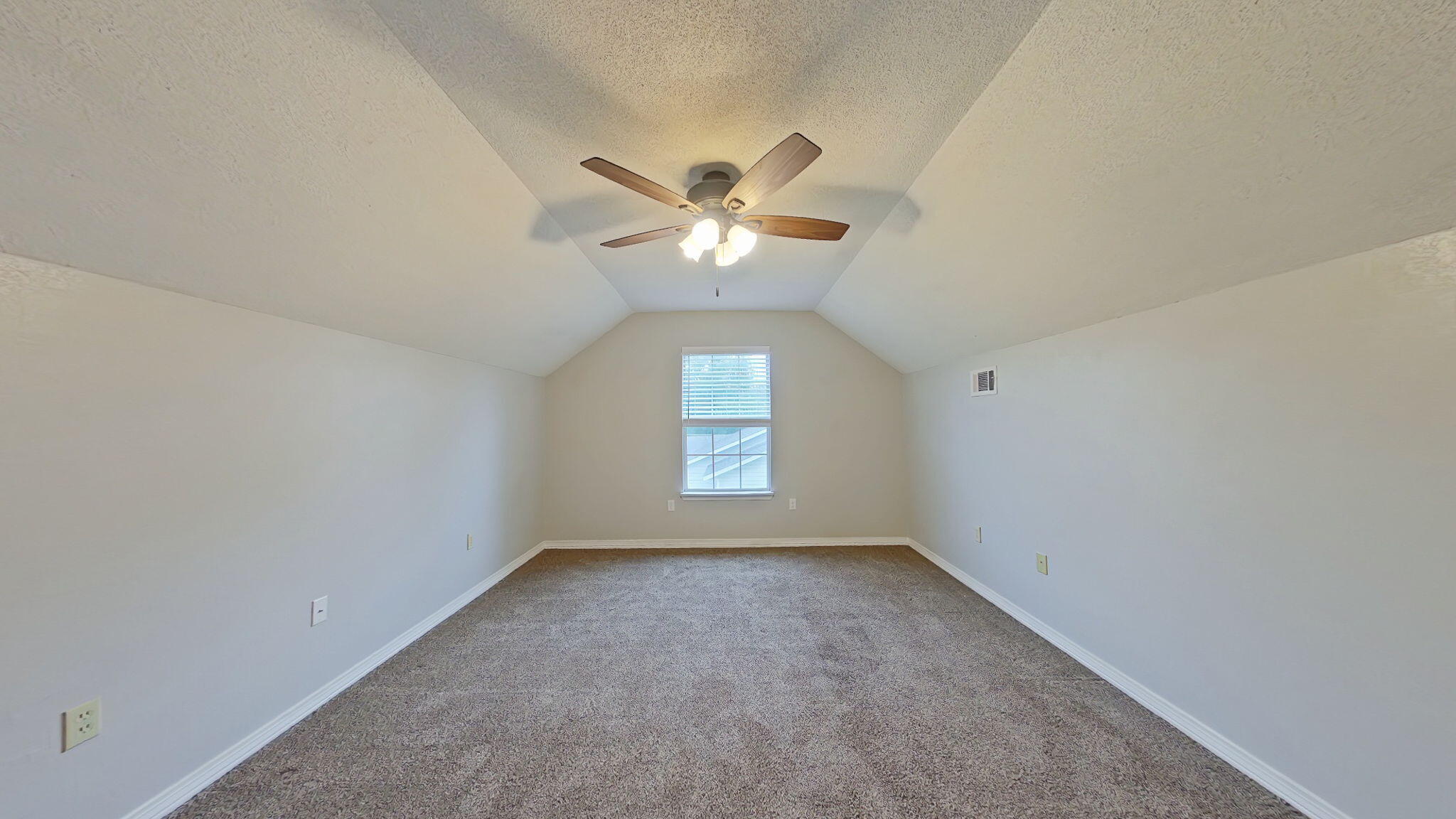 212 Water Oak Lane Crestview, FL 32539 - Photo 17 of 29 wooden floor in an empty room with a window
