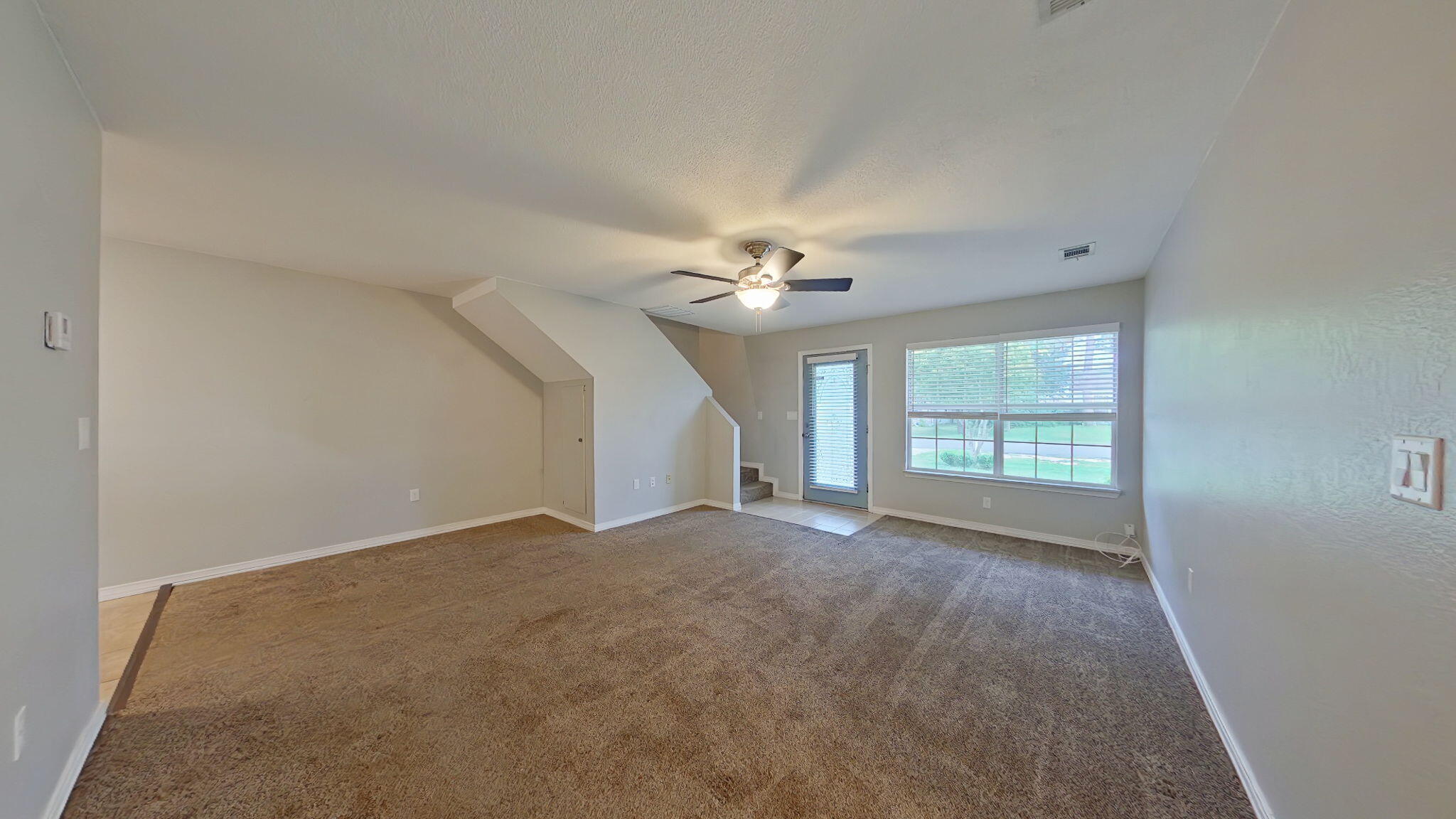 212 Water Oak Lane Crestview, FL 32539 - Photo 7 of 29 a view of an empty room with a window