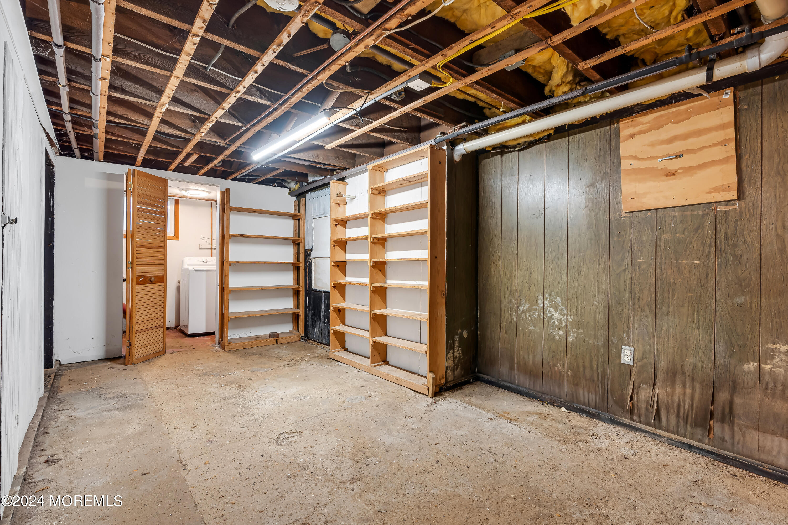 45 2nd Street Keyport, NJ 07735 - Photo 20 of 24 a view of empty room with wooden walls