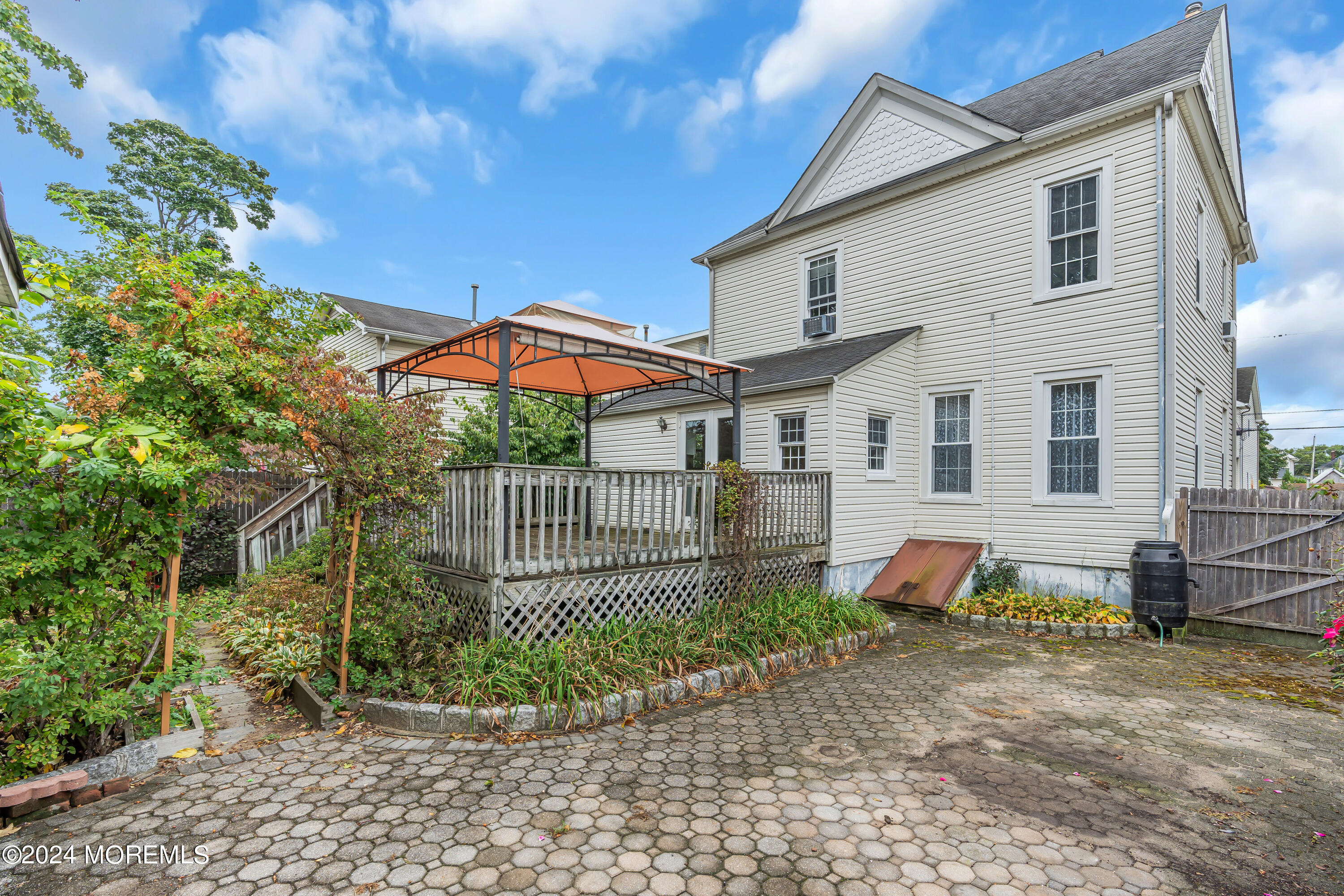 45 2nd Street Keyport, NJ 07735 - Photo 23 of 24 a front view of a house with garden