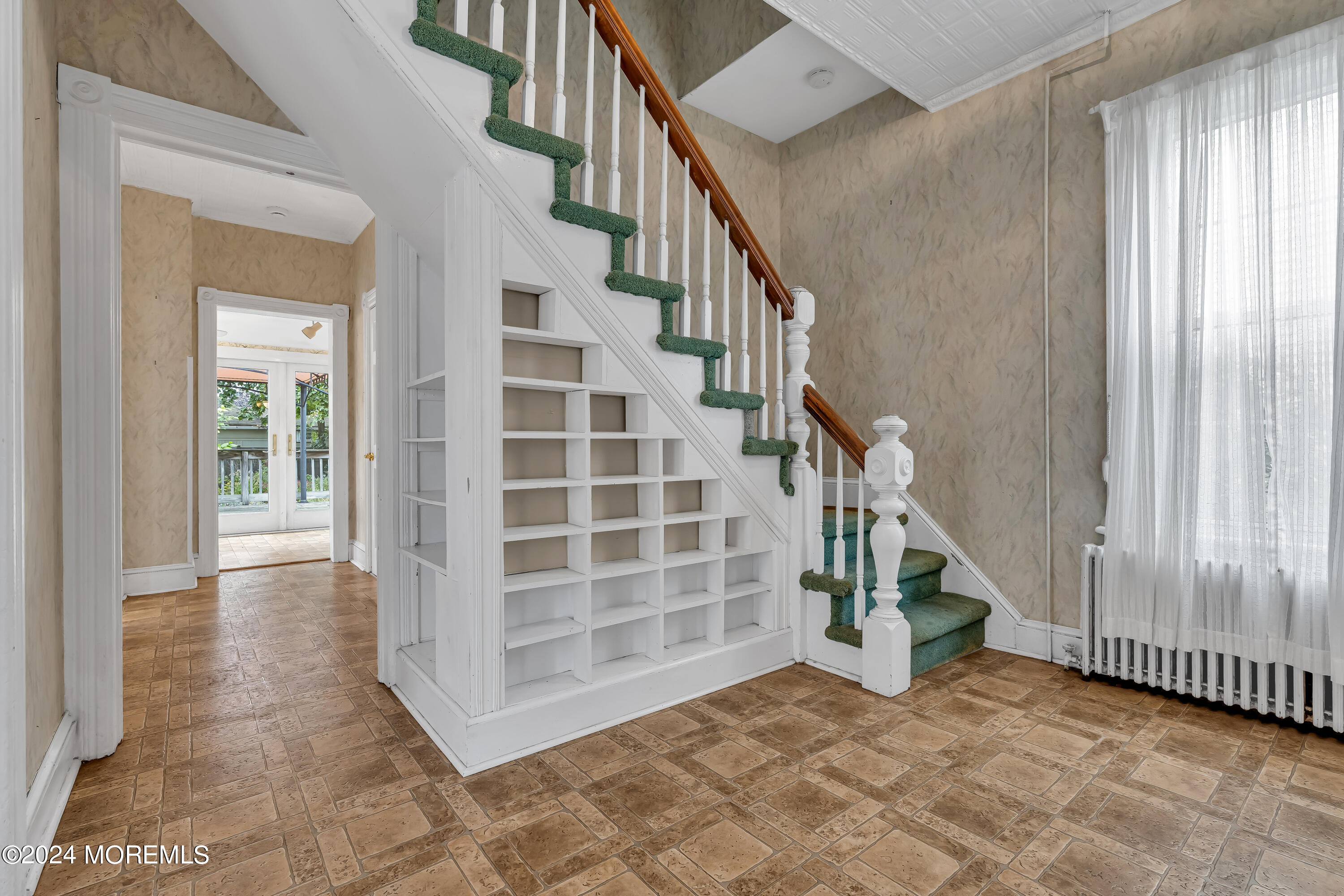 45 2nd Street Keyport, NJ 07735 - Photo 4 of 24 a view of an entryway with staircase