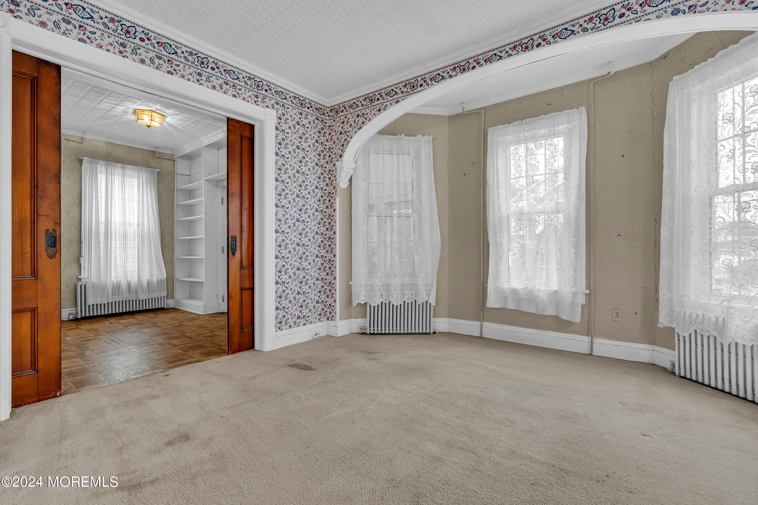 45 2nd Street Keyport, NJ 07735 - Photo 6 of 24 an empty room with windows