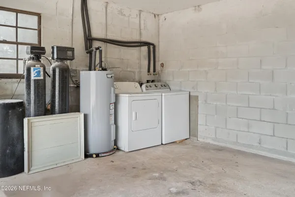 a utility room with dryer and washer