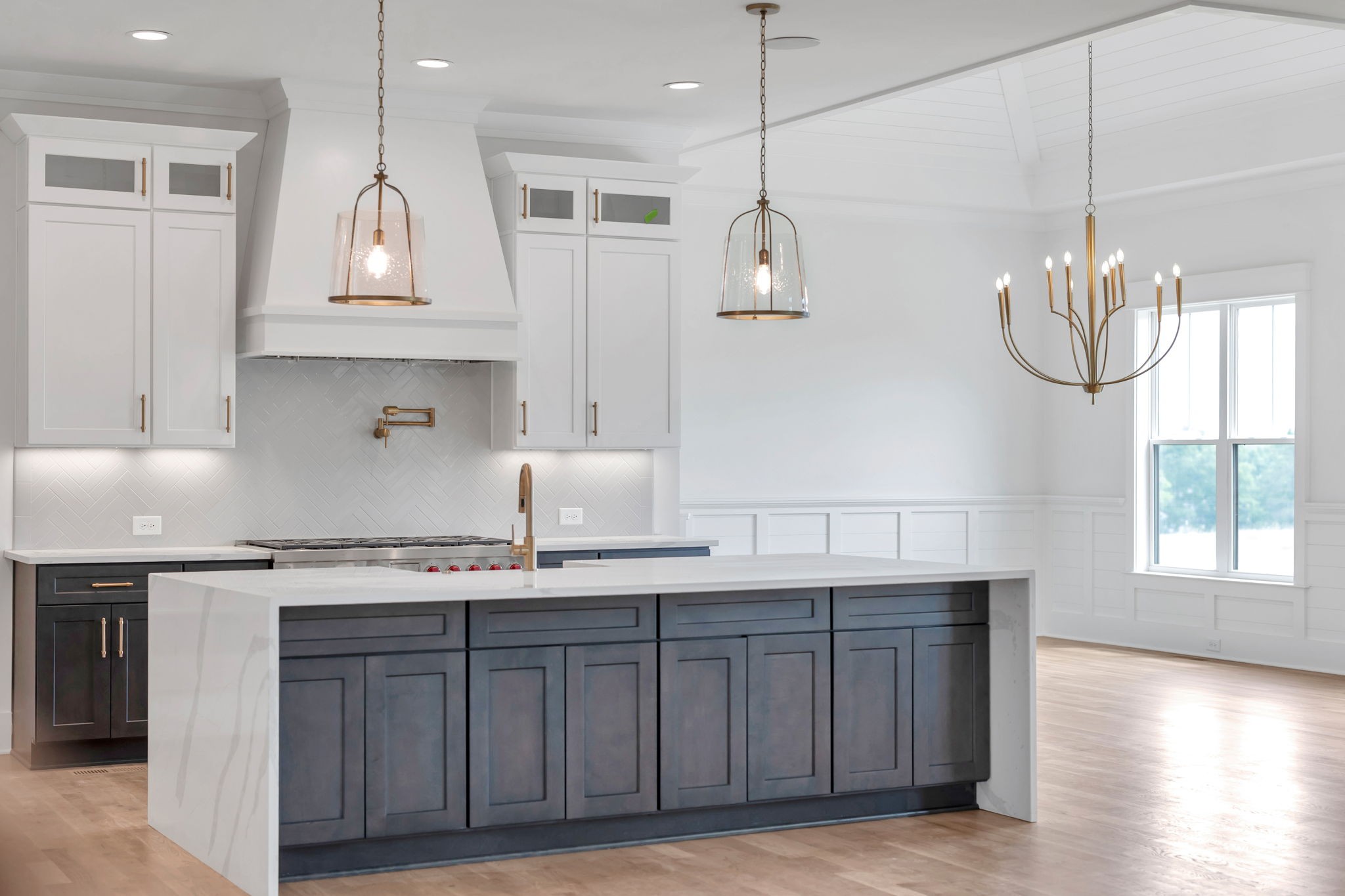 5925 Hunt Valley Drive Spring Hill, TN 37174 - Photo 15 of 69 a kitchen with stainless steel appliances granite countertop a sink a stove and a wooden floors
