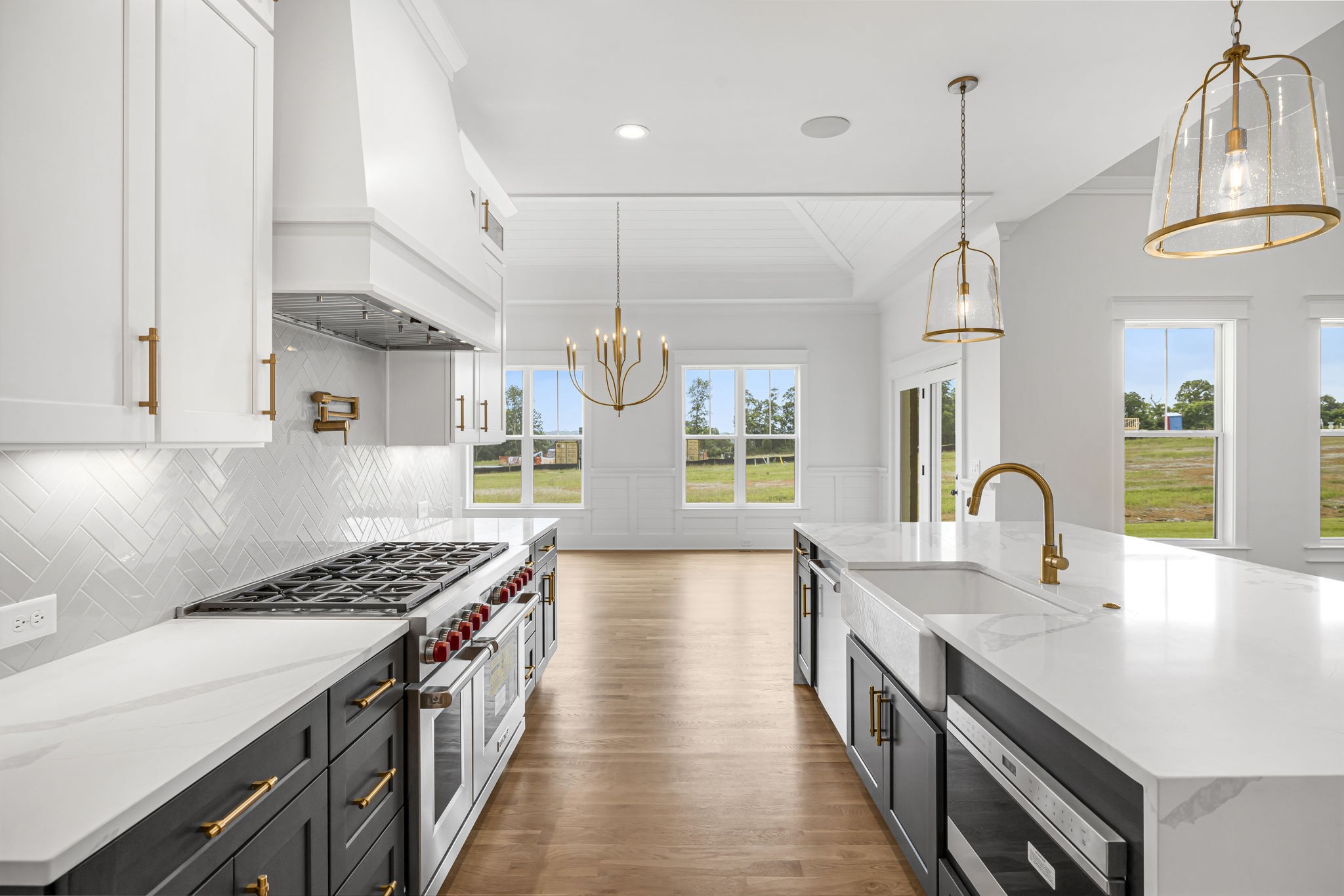 5925 Hunt Valley Drive Spring Hill, TN 37174 - Photo 16 of 69 a kitchen with stainless steel appliances granite countertop a stove and a sink
