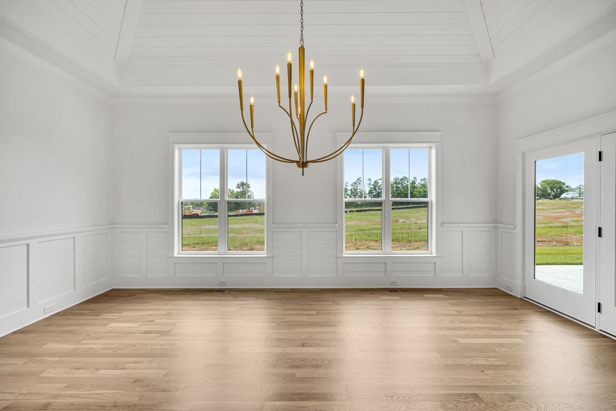 5925 Hunt Valley Drive Spring Hill, TN 37174 - Photo 21 of 69 an empty room with wooden floor and windows