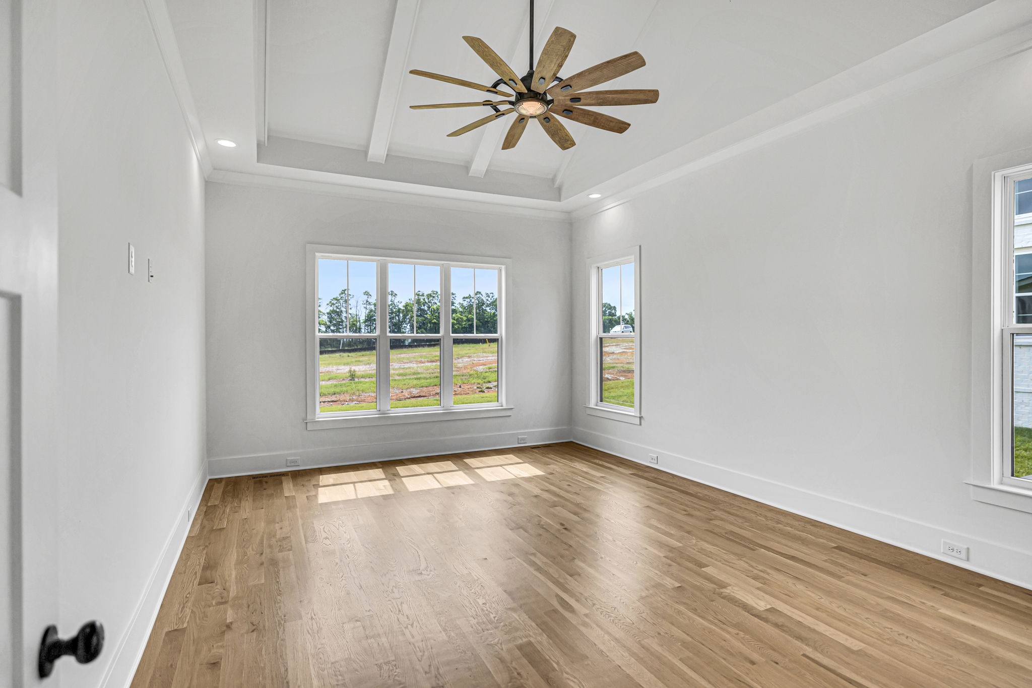 5925 Hunt Valley Drive Spring Hill, TN 37174 - Photo 24 of 69 wooden floor in an empty room with a window
