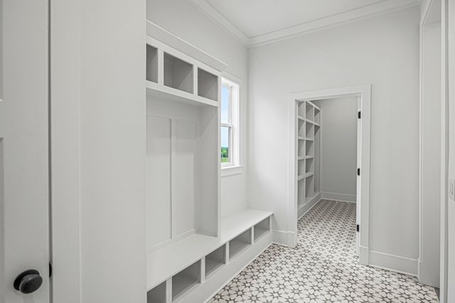 a bathroom with a sink a shower and a mirror