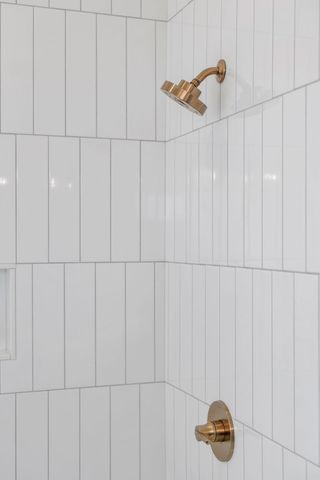 a room with a bed and a window