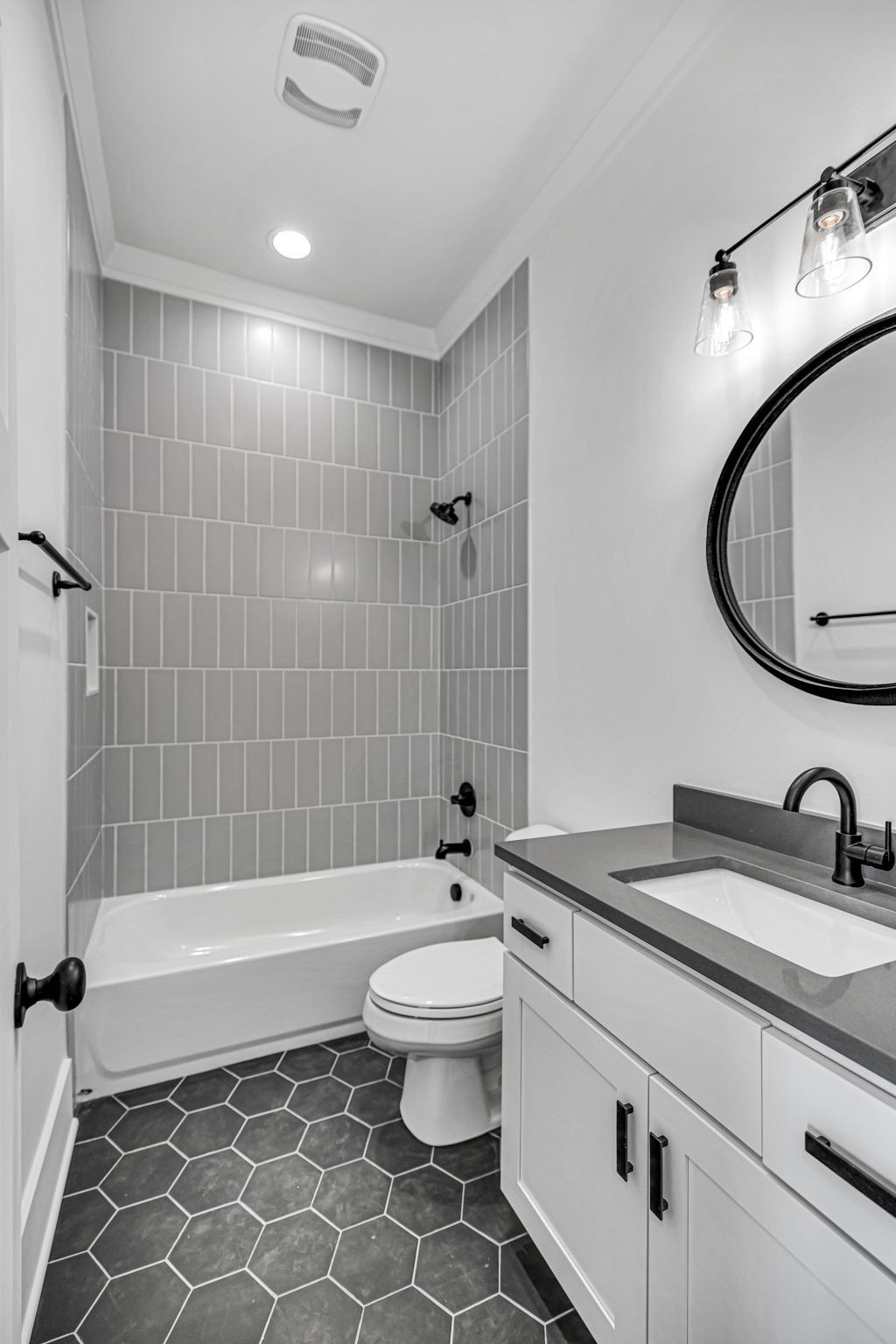 5925 Hunt Valley Drive Spring Hill, TN 37174 - Photo 36 of 69 a bathroom with a sink a toilet and a mirror