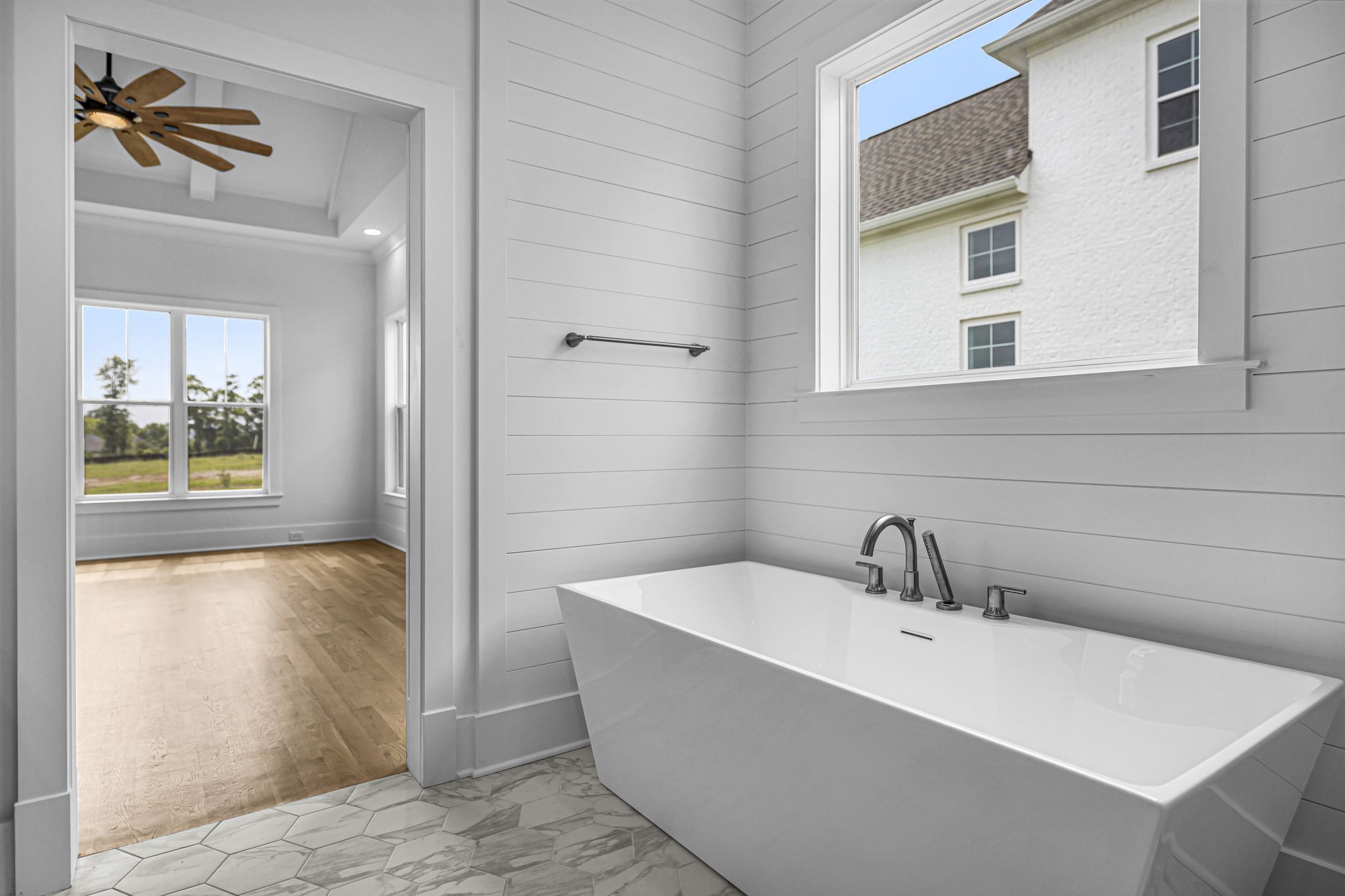 5925 Hunt Valley Drive Spring Hill, TN 37174 - Photo 41 of 69 a bathroom with a bathtub and a sink